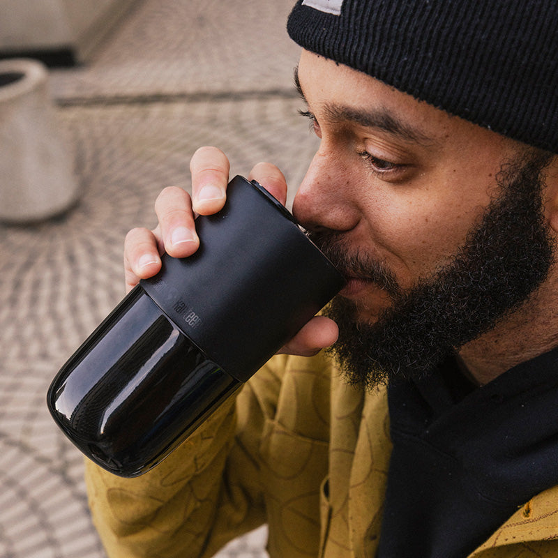 16oz-rise-tumbler-k1 16oz_rise_tumbler_black_man_drink_square.jpg