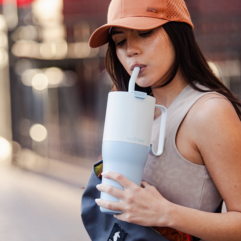 36oz-rise-tumbler-with-straw-lid-z5 36oz_rise_tumbler_straw_girl_sip_square.jpg